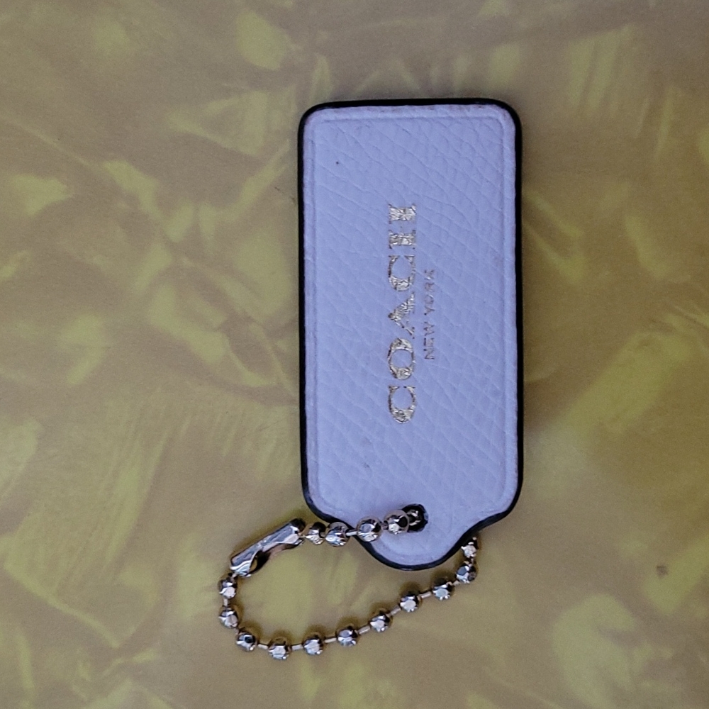 Coach bag tag white